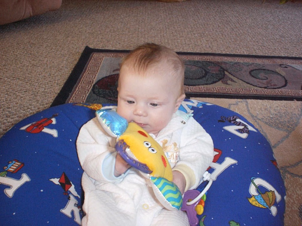 On boppy pillow with rattle